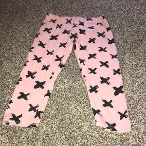 Light pink capris with exes